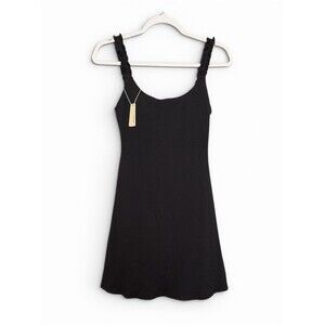 New OGL Black Ribbed black mini dress with attached jumpsuit. Size Small